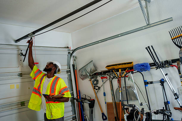 Professional Garage Door technician working in Oak Park, MI